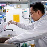 John Lee working in his lab